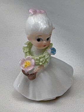Vintage Napcoware Bone China Girl Figurine Holding Flower Adorned 2" Tall